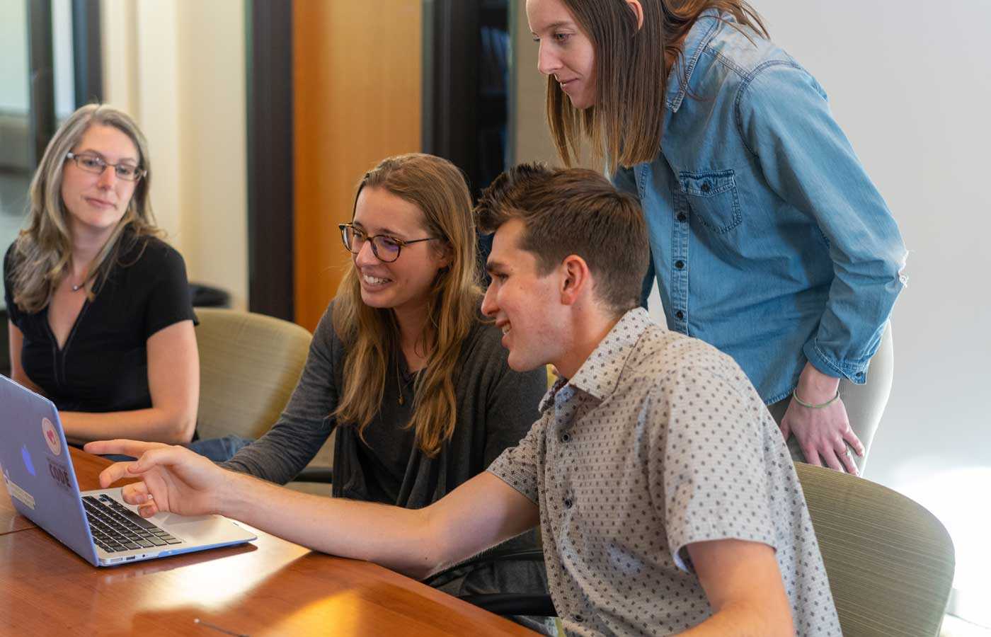 team of people looking at employee benefits